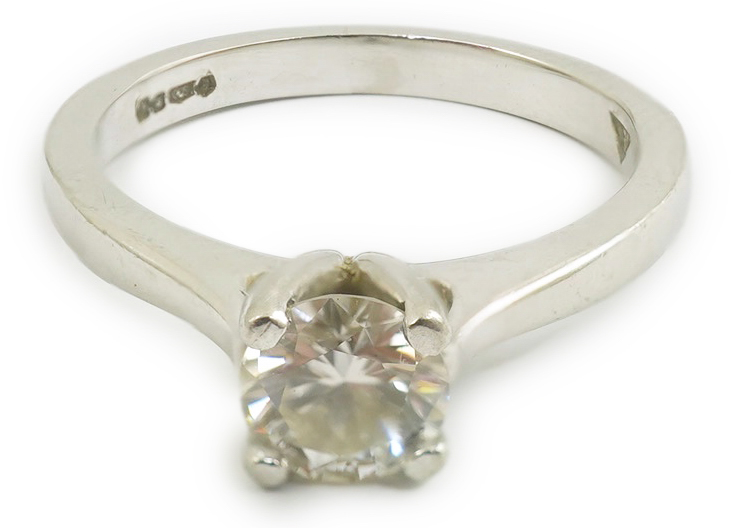 A modern platinum and solitaire diamond set ring
